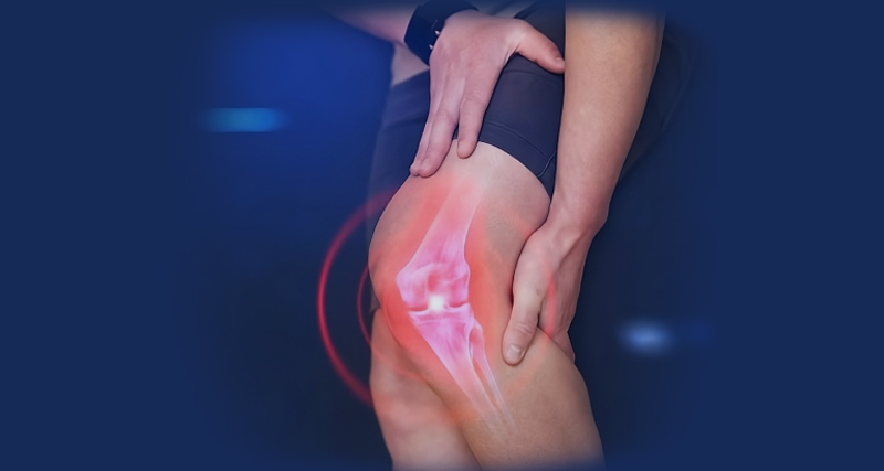 Person holding the back of the knee with a visual overlay of inflamed joint, indicating pain from a Baker’s cyst.