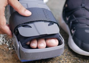 Close-up of foot in orthopaedic walking boot for broken toe recovery
