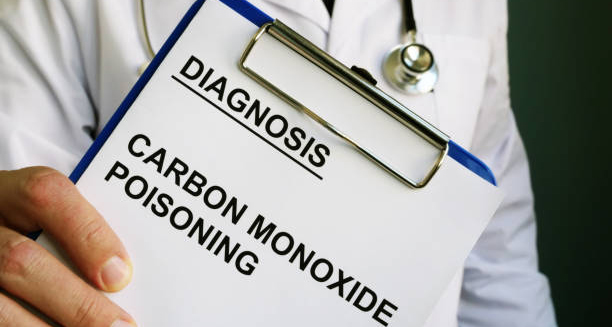 Doctor holding a clipboard with a diagnosis of carbon monoxide poisoning