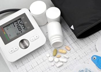 Blood pressure monitor, ECG results, and pills used for diagnosing cardiomyopath