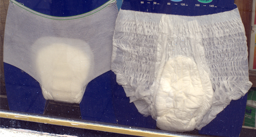 Adult incontinence pads and underwear on display