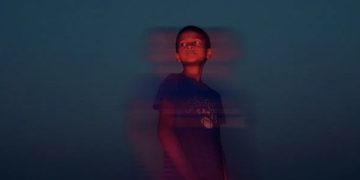 Child with blurred visual effect representing vision problems