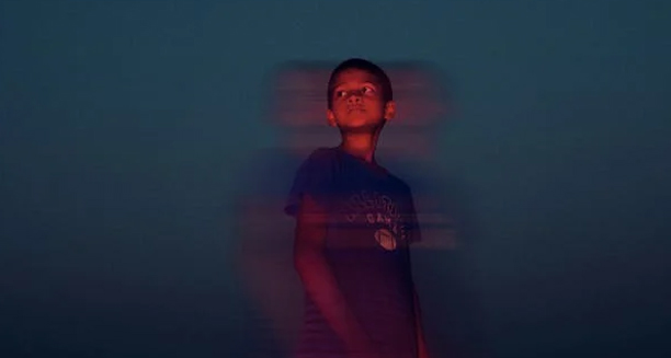 Child with blurred visual effect representing vision problems