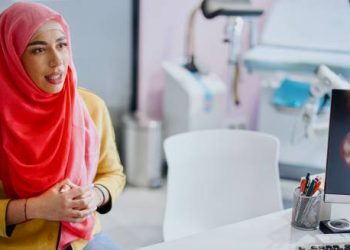 Woman consulting a doctor about cervical cancer treatment