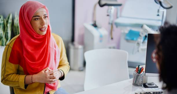 Woman consulting a doctor about cervical cancer treatment