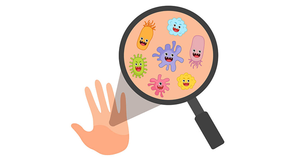 Cartoon germs on hand under magnifying glass illustrating causes of conjunctivitis