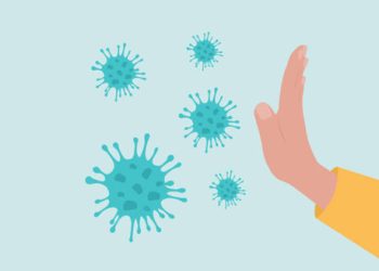 Hand blocking virus particles representing infection causes of febrile seizures
