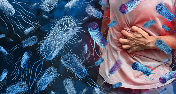 Illustration of bacteria causing cholera and a person clutching their stomach in pain