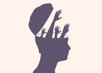 Abstract silhouette of a head with hands reaching out from the brain, symbolising complications of chronic traumatic encephalopathy.