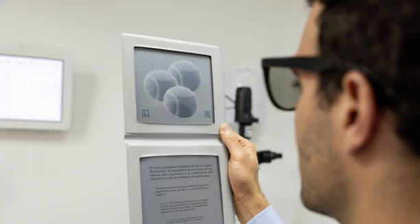 Man viewing a colour blindness test chart during an eye examination