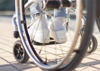 Doctor examining patient's leg for complications of compartment syndrome
