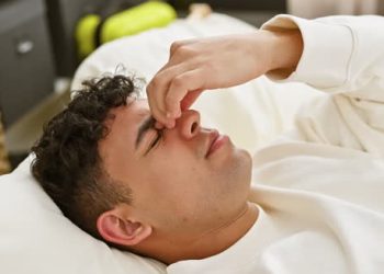 Doctor handing antiviral medication to a patient during CMV treatment consultation