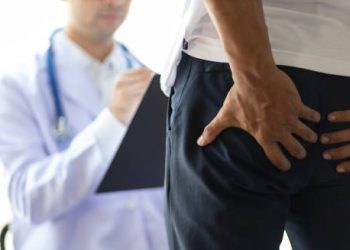 Patient with abdominal pain consulting doctor about diarrhoea complications