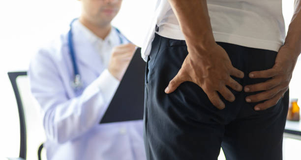 Patient with abdominal pain consulting doctor about diarrhoea complications