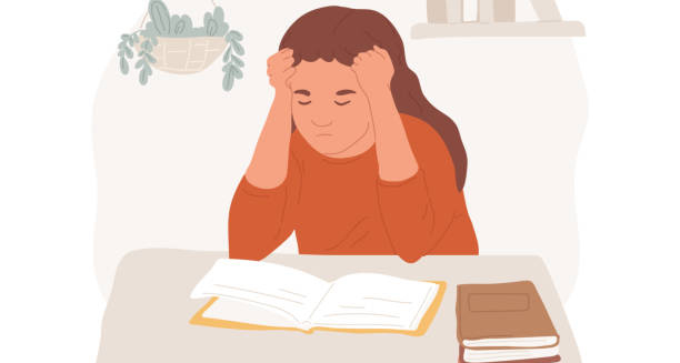 Frustrated girl struggling to study due to dyspraxia complications
