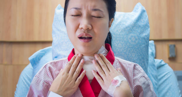 Woman recovering from a tracheostomy due to complications of epiglottitis