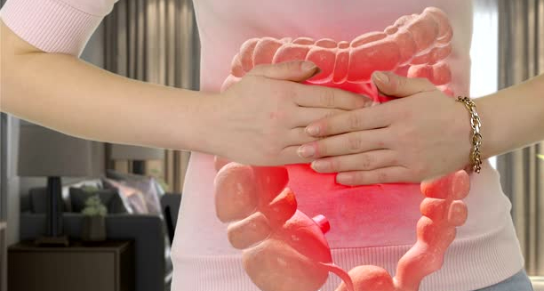 Illustration of a woman holding her abdomen highlighting an inflamed large intestine, representing constipation discomfort.