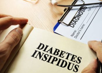 Notebook with Diabetes Insipidus title near medical report