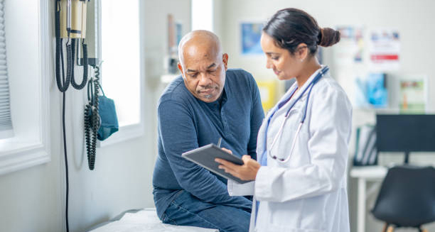 Doctor discussing chilblains diagnosis with a patient in a clinic