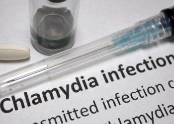 Chlamydia infection diagnosis with syringe and medication