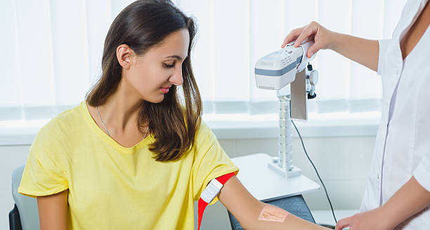 Woman undergoing a medical test on her arm, possibly a skin or blood test, as part of diagnostic procedures for Cushing’s syndrome.