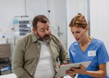 Nurse discussing diabetes diagnosis with patient