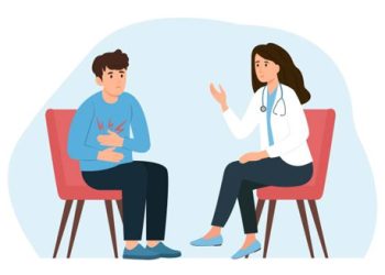 Doctor consulting patient with stomach pain during diarrhoea diagnosis