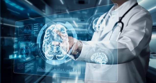 Doctor analysing digital brain scans for epilepsy diagnosis