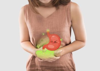 Woman holding stomach with illustrated inflamed gut indicating diarrhoea symptoms