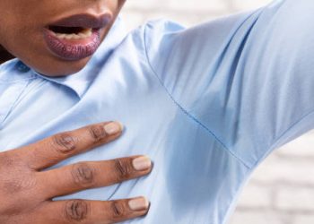 Woman surprised by underarm sweat patch