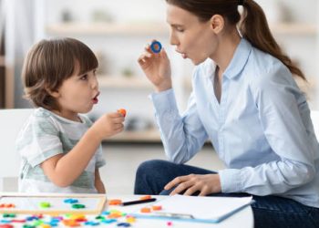 Child receiving speech therapy for dyslexia
