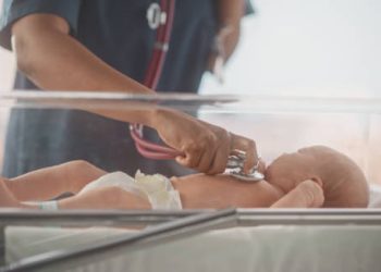 Newborn with Edwards’ Syndrome receiving medical care in a neonatal unit.