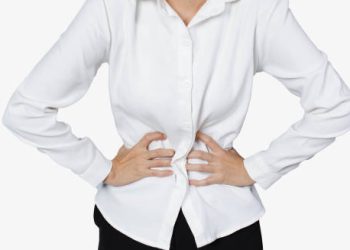 Woman clutching her stomach due to complications from gastroparesis