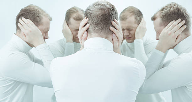 Man overwhelmed by thoughts, symbolising complications of generalised anxiety disorder