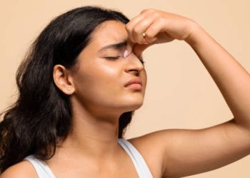 Doctor preparing medication for complications related to hereditary haemorrhagic telangiectasia