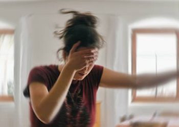 Woman experiencing dizziness due to severe hypoglycaemia