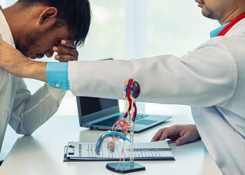 Doctor comforting patient during gastritis diagnosis discussion