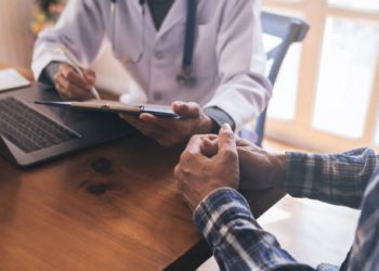 Doctor consulting a patient about insomnia diagnosis