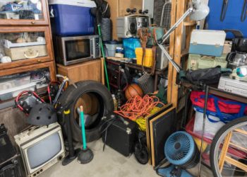 Cluttered storage room filled with miscellaneous household items, representing hoarding disorder
