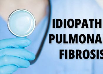 Medical professional holding stethoscope next to text reading Idiopathic Pulmonary Fibrosis