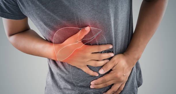 Person clutching upper abdomen with liver and gallbladder area highlighted