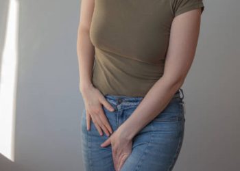 Woman experiencing genital discomfort possibly due to herpes