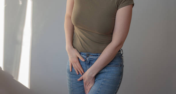 Woman experiencing genital discomfort possibly due to herpes