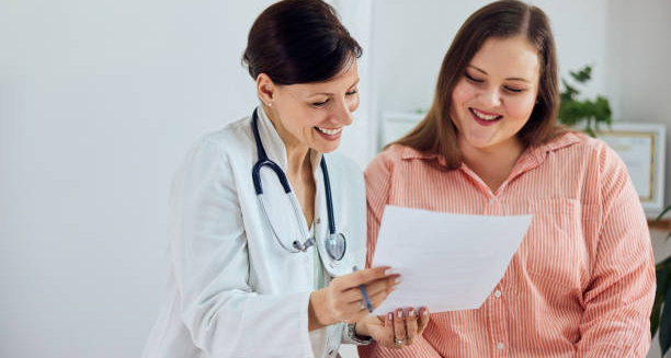 Doctor and patient reviewing treatment plan for food colour sensitivity