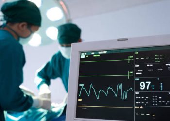 Heart monitor in operating room during heart attack treatment surgery