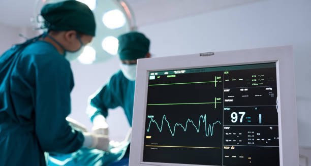 Heart monitor in operating room during heart attack treatment surgery