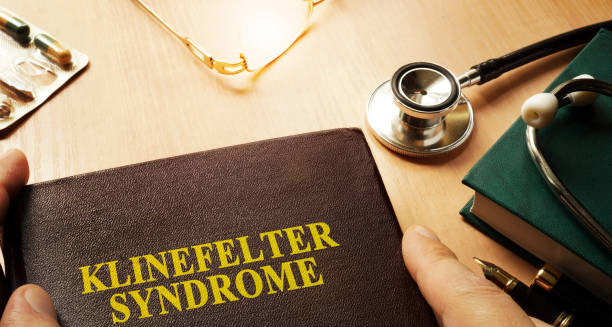 Medical file labelled Klinefelter Syndrome on desk with stethoscope and medication